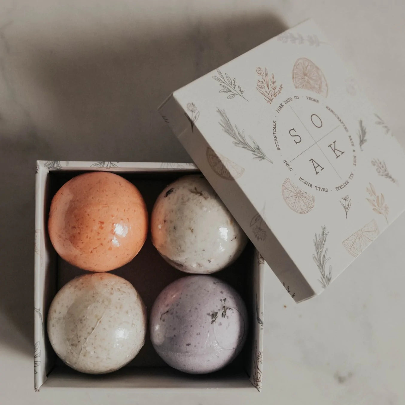 gift box with four mini bath bombs